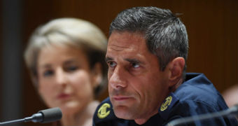 Roman Quaedvlieg purses his lips during a Senate estimates hearing