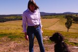 Khat Hammond at her Clifton Creek property with her dog Finegan