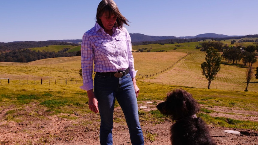 Khat Hammond at her Clifton Creek property with her dog Finegan