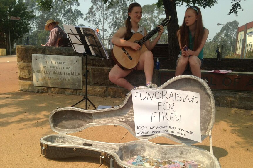 Girls busking to raise money for bushfire relief