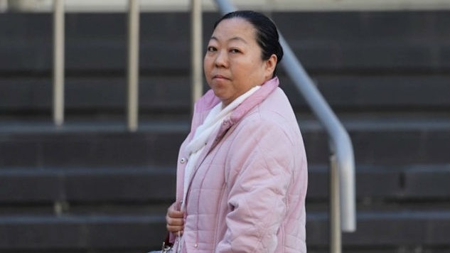 Honbo Wang on the steps of the Coroner's court in Perth