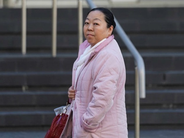 Honbo Wang on the steps of the Coroner's court in Perth