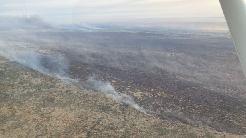 An aerial view of a huge fire in the outback.