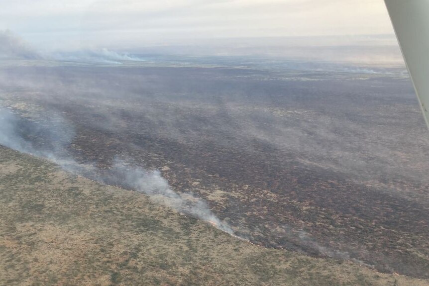An aerial view of a huge fire in the outback.