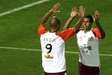 Tahj Minniecon and Sergio van Dijk celebrate a goal