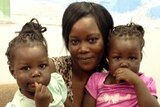 Lusia Santinow with her toddler twins.
