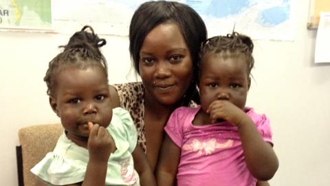 Lusia Santinow with her toddler twins.