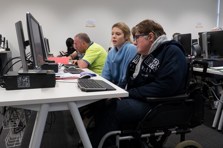 Flinders University Community Re-entry Program participants work on their computer skills.