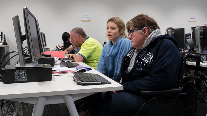 Flinders University Community Re-entry Program participants work on their computer skills.