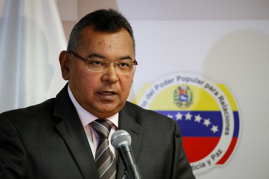 Venezuela's Interior and Justice Minister Nestor Reverol speaks into a microphone.