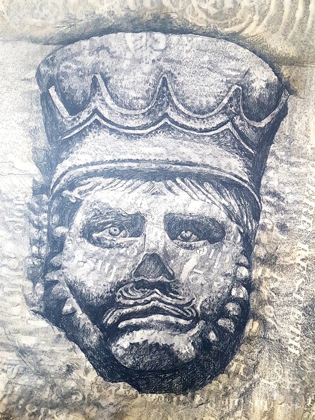 Black and white carving of a picture of a man