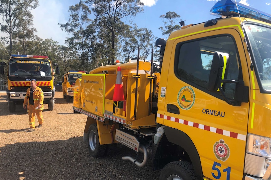 Fire trucks arrive at Canungra.