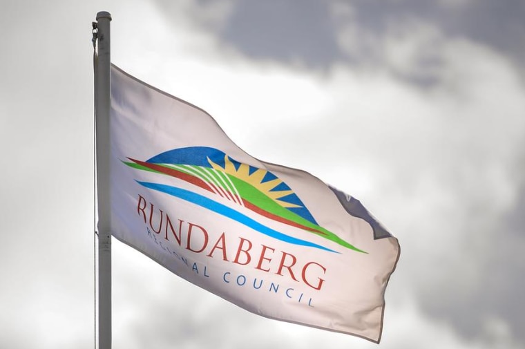 A flag pole with a flag that reads Bundaberg Regional Council