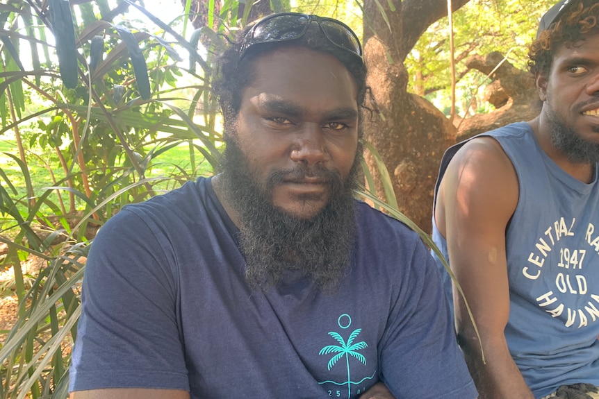 A close-up of a man looking into the camera.