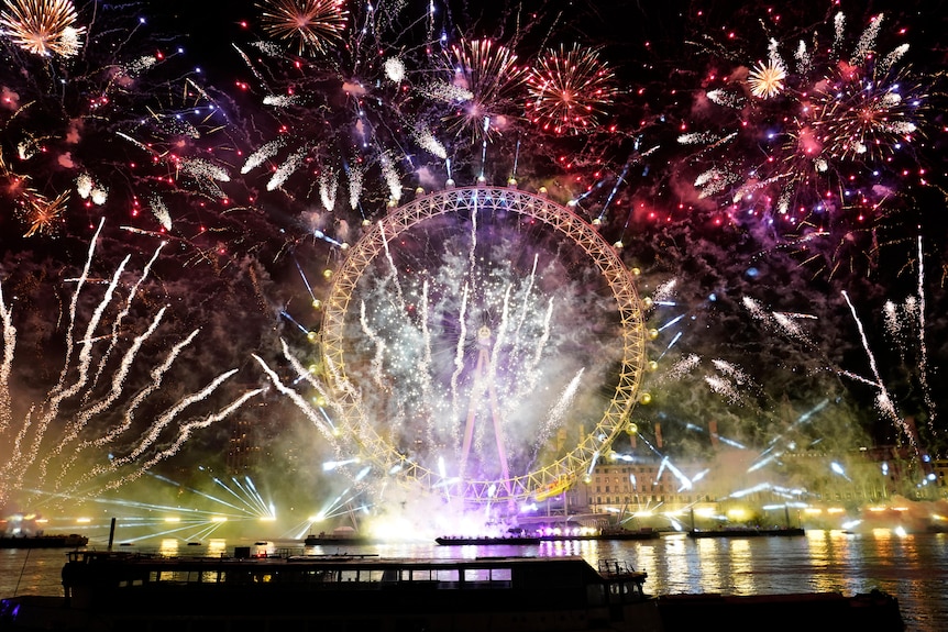 Fireworks light-up the sky over the London Eye in central London.
