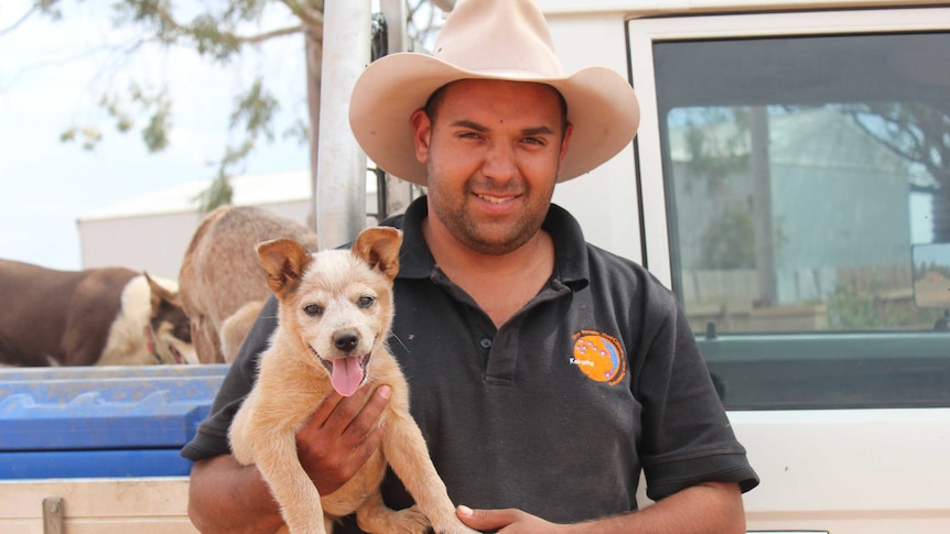 Station hand Cameron and his dog Bundy on Roxby Downs Station