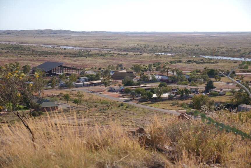 A tiny outback town, as seen from a hill.