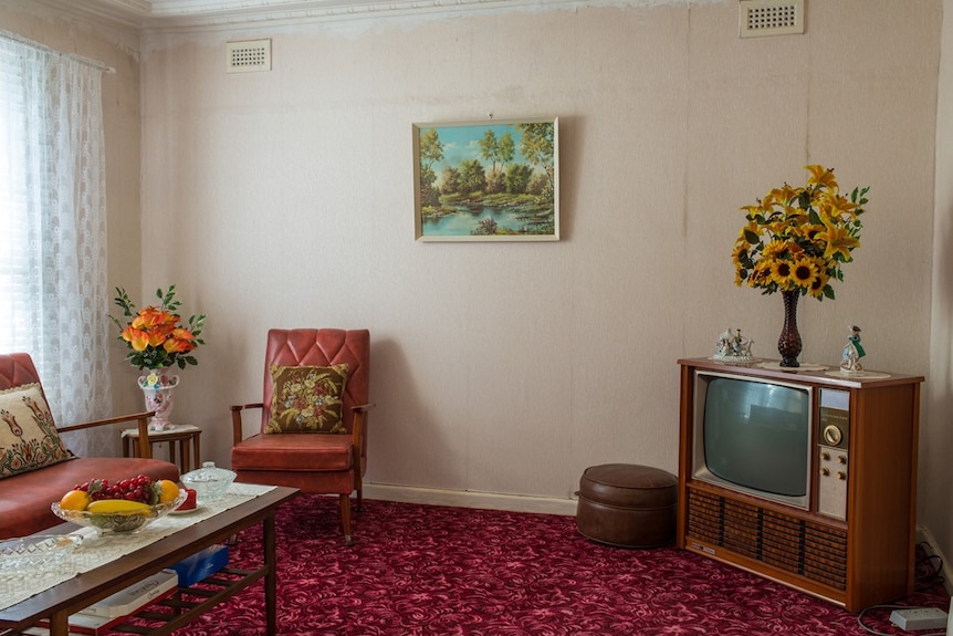 Living room with old fashioned TV and furniture