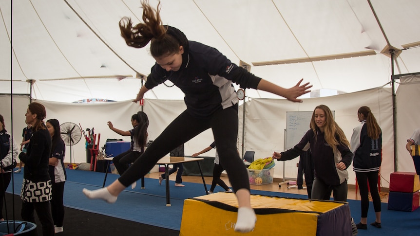 Students practise their jumps at Circus SmARTs.