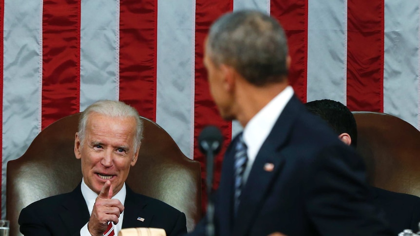Vice President Joe Biden points to Barack Obama while Obama delivered his final State of the Union address.
