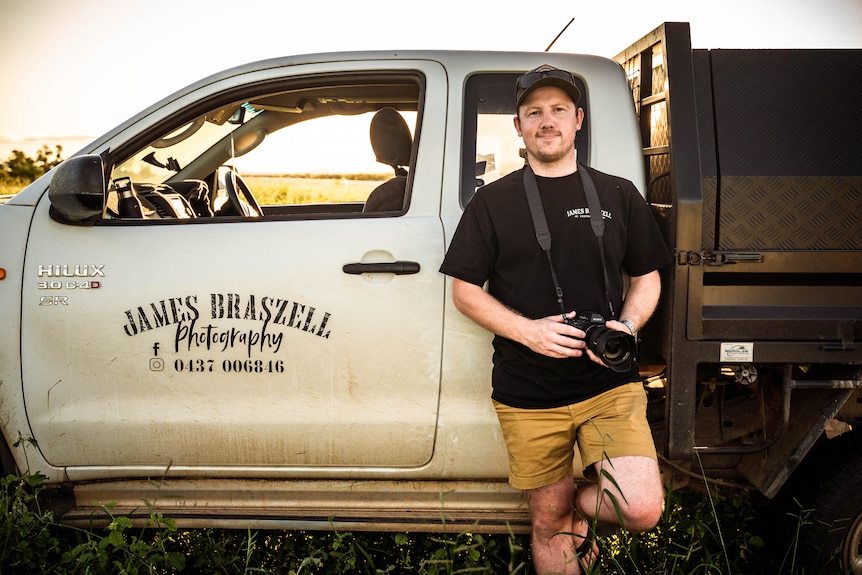 James Braszell standing next to his ute