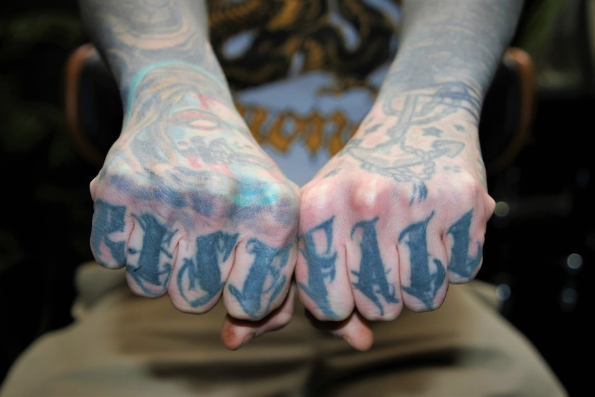 Taz Connell has tattoos covering both his hands. 