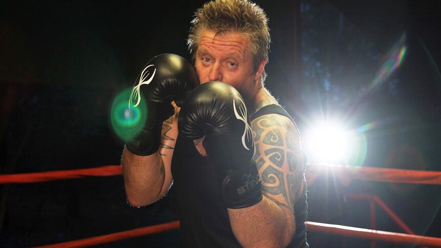 A photo of boxer Brad Kylie in the ring.