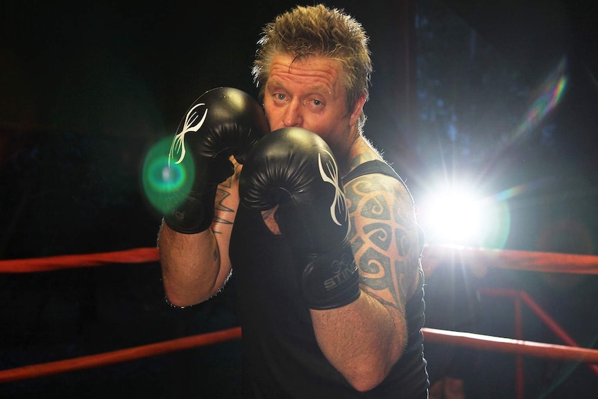 A photo of boxer Brad Kylie in the ring.
