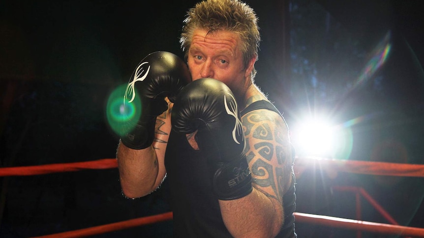 A photo of boxer Brad Kylie in the ring.