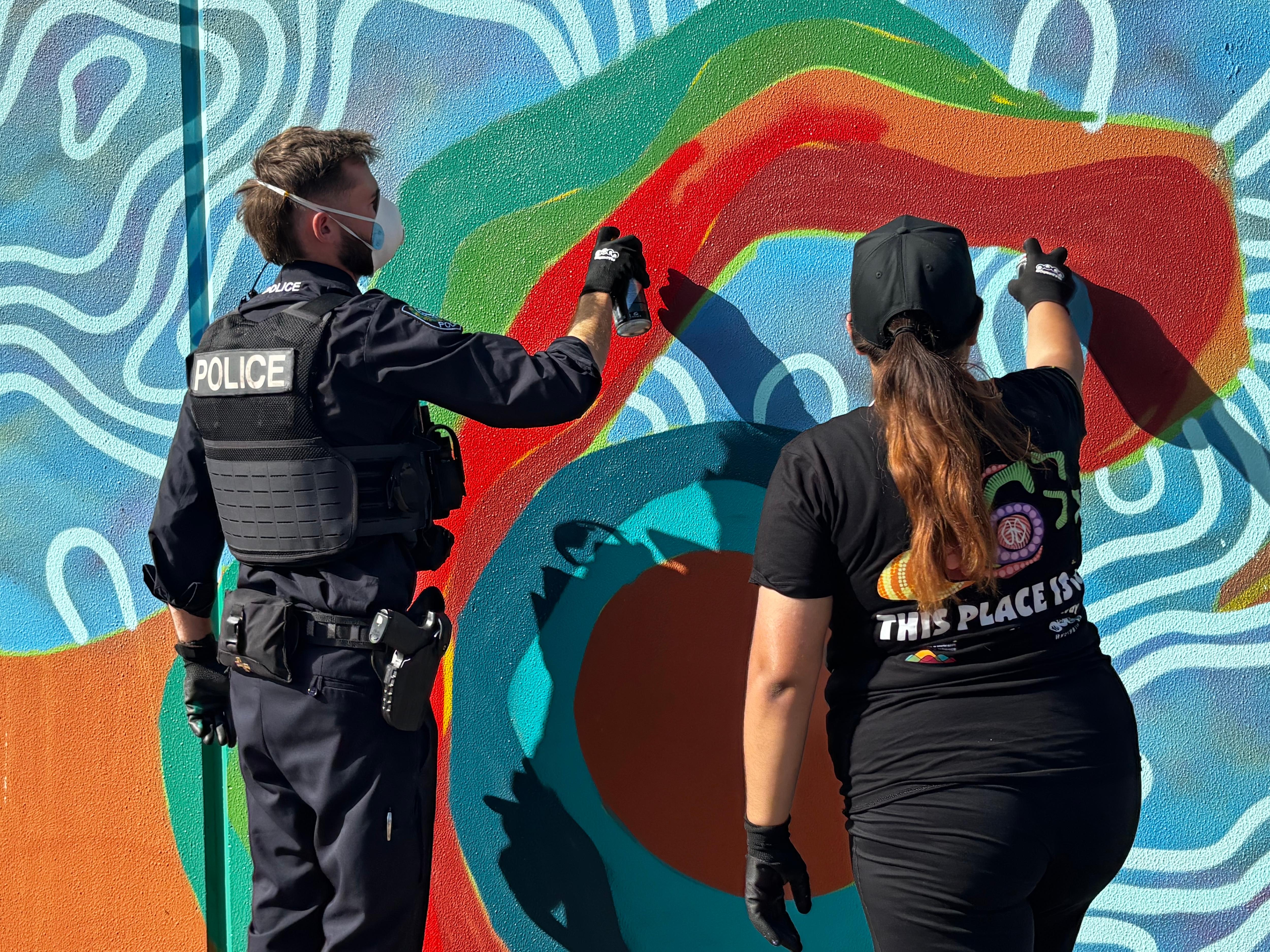 Mural paints story of community's hope of turning tide on crime