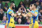 Semi Radradra (L) after scoring a try for the Eels against the Storm at AAMI Park.