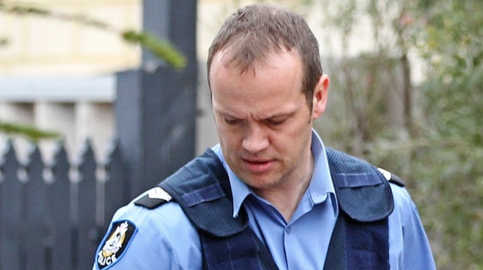 Police officer as part of Operation Crackdown drug raids