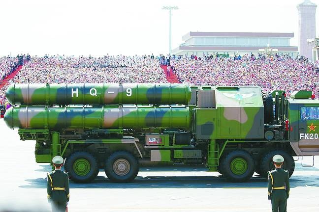 The green camouflaged missiles sit on a launch truck of the same colour.