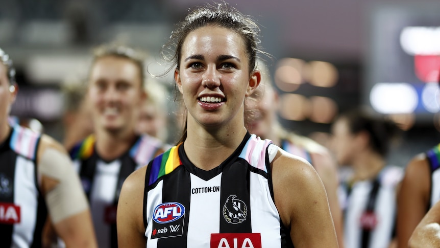 Collingwood's Chloe Molloy celebrates a win over Geelong in AFLW