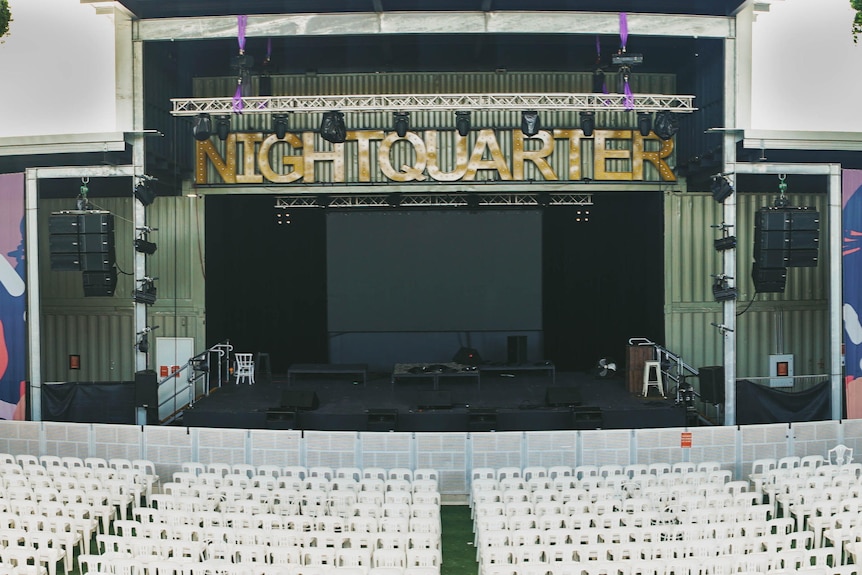 An empty concert venue with stage.