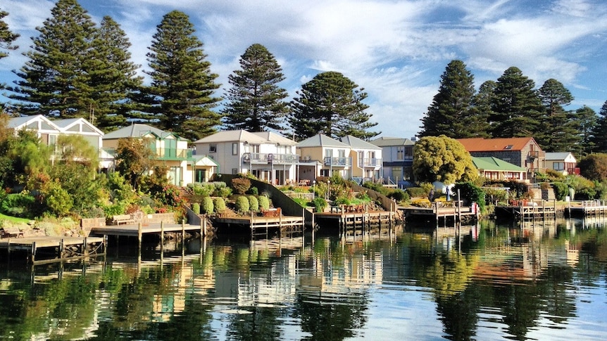 A row of houses in a river