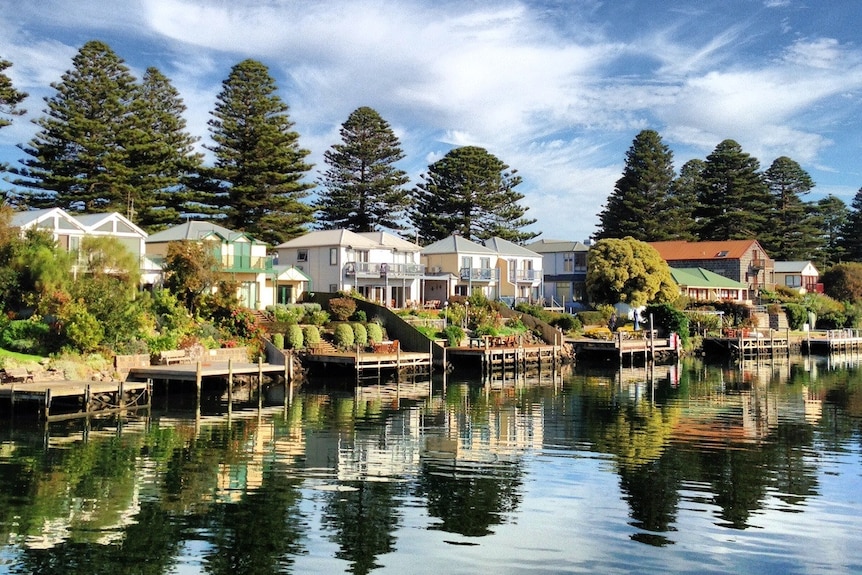 A row of houses in a river