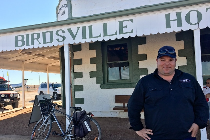 Ben Fullagar standing outside the front of the Birdsville Hotel