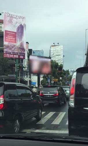 Indonesian man arrested for suspected billboard porn video 'hack' - ABC
