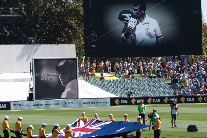 A video collage tribute to Phillip Hughes was played before play began at the Adelaide Test.