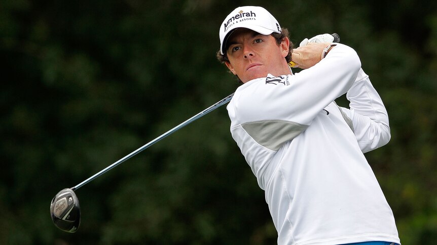 McIlroy holds on to win