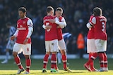 Arsenal players celebrate after beating West Bromwich Albion 2-1 to go fourth in the Premier League.