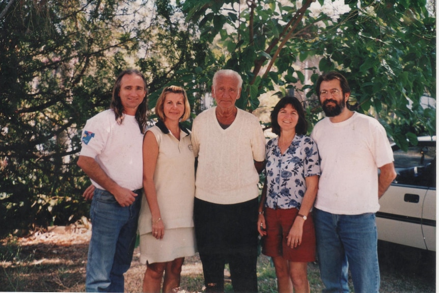 Photo of father with adult children