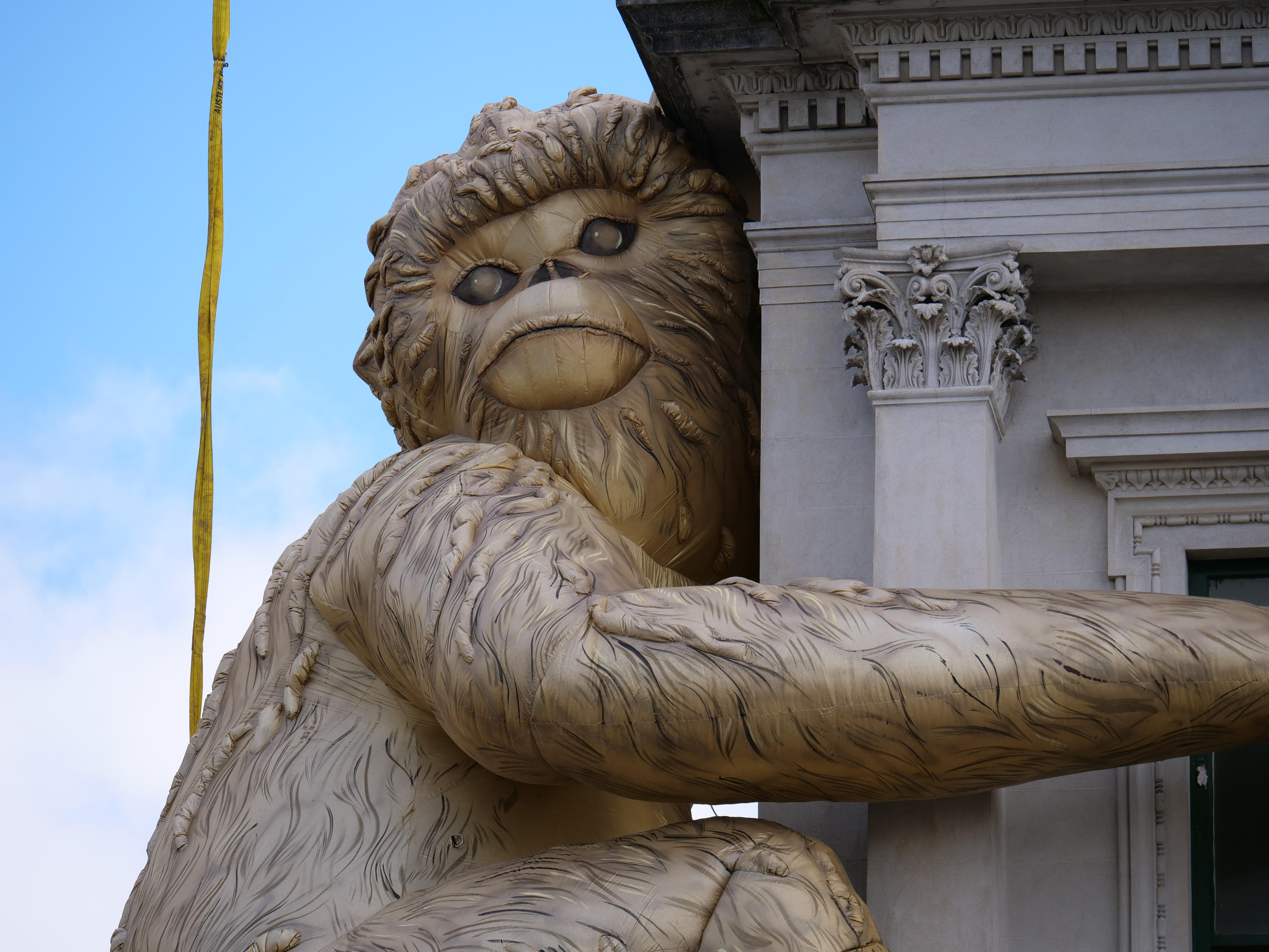 A large inflatable monkey gold in colour