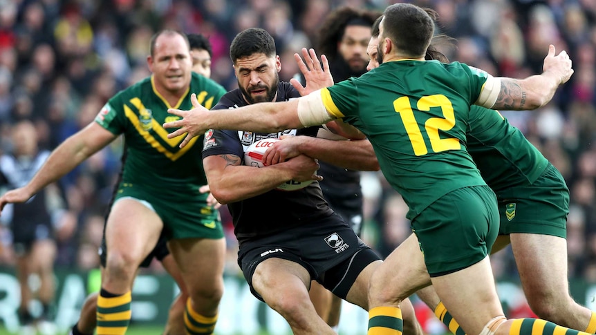 Jesse Bromwich wrapped up by Kangaroos defence