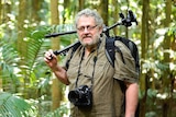Wildlife Photographer Steve Parish with tripod over shoulder.