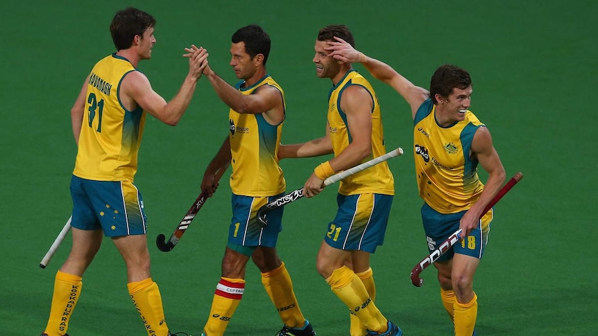 Australia's Jamie Dwyer celebrates after he scores for the Kookaburras against England.