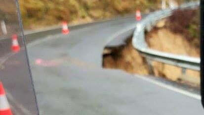 The edge of a road damaged by rain at Brown Mountain in south-east New South Wales.