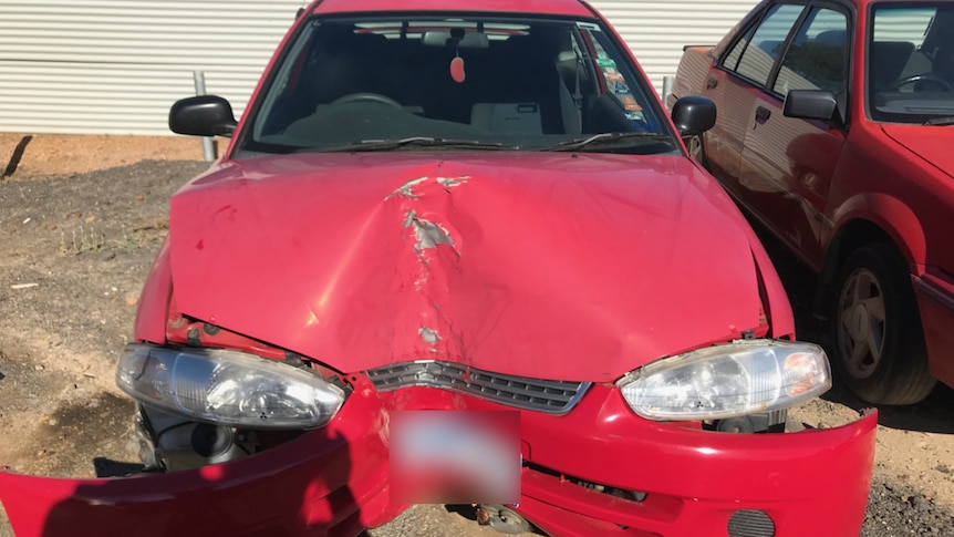 Joshua Sherman's damaged car