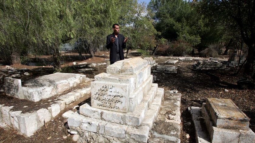 Hatem Abdelkader prays at the site where a Museum of Tolerance will be constructed
